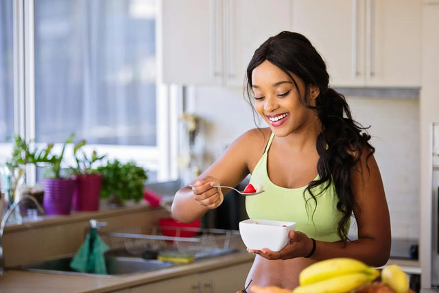  Woman showing how hormone balancing diet plan can help you stay healthy and happy