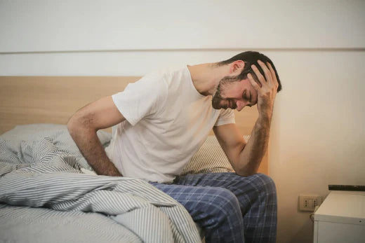 a man in pain due to adrenal fatigue